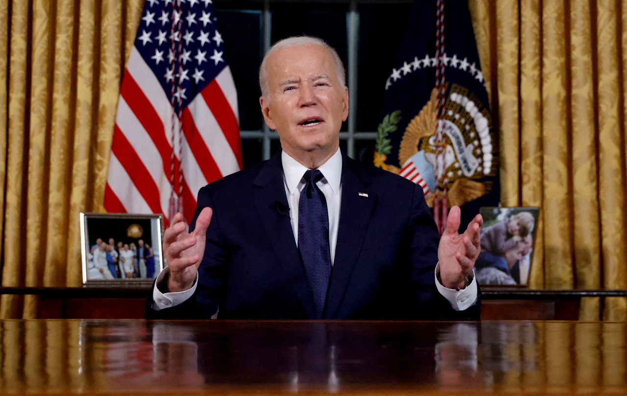 President Joe Biden delivers an address on the war between Israel and Hamas at the White House in Washington on Oct. 19. (Reuters-Yonhap)