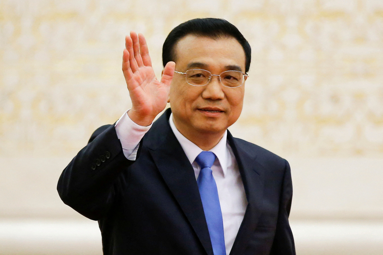 China's Premier Li Keqiang waves as he arrives for a news conference after the closing ceremony of China's National People's Congress at the Great Hall of the People in Beijing, China, in 2017. (Reuters-Yonhap)