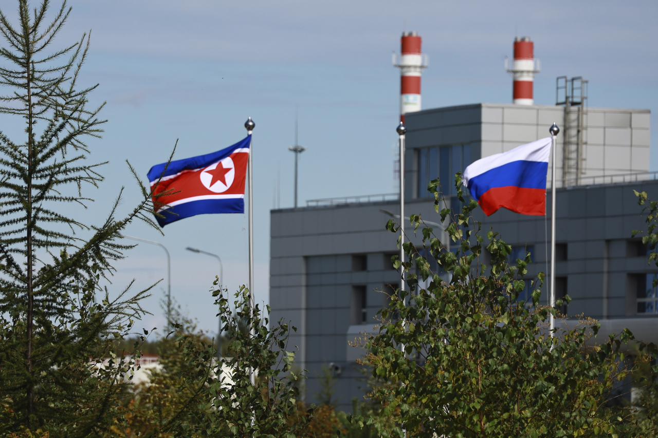 North Korean and Russian flags are seen at the Vostochny cosmodrome outside the city of Tsiolkovsky, about 200 kilometers from the city of Blagoveshchensk in the far eastern Amur region, Russia, on Sept. 13, 2023. (File Photo - AP)