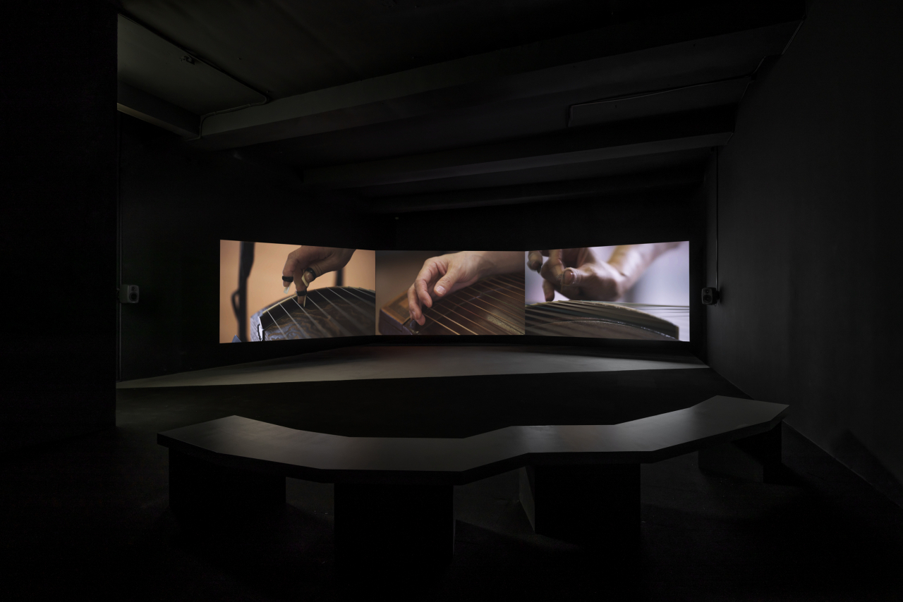 An installation view of three-channel video 