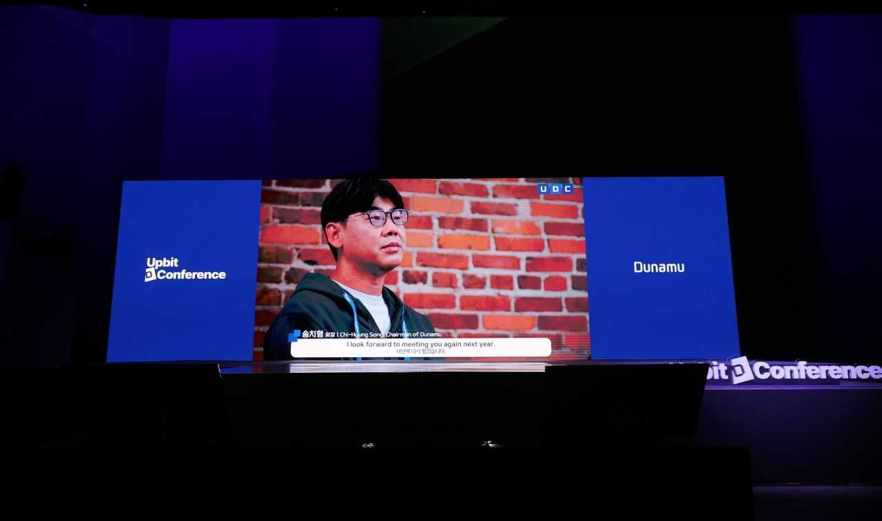 Song Chi-hyung, chairman of Dunamu, delivers an opening speech online at the Upbit D Conference at the Grand Walkerhill Seoul in eastern Seoul, Monday. (Dunamu)
