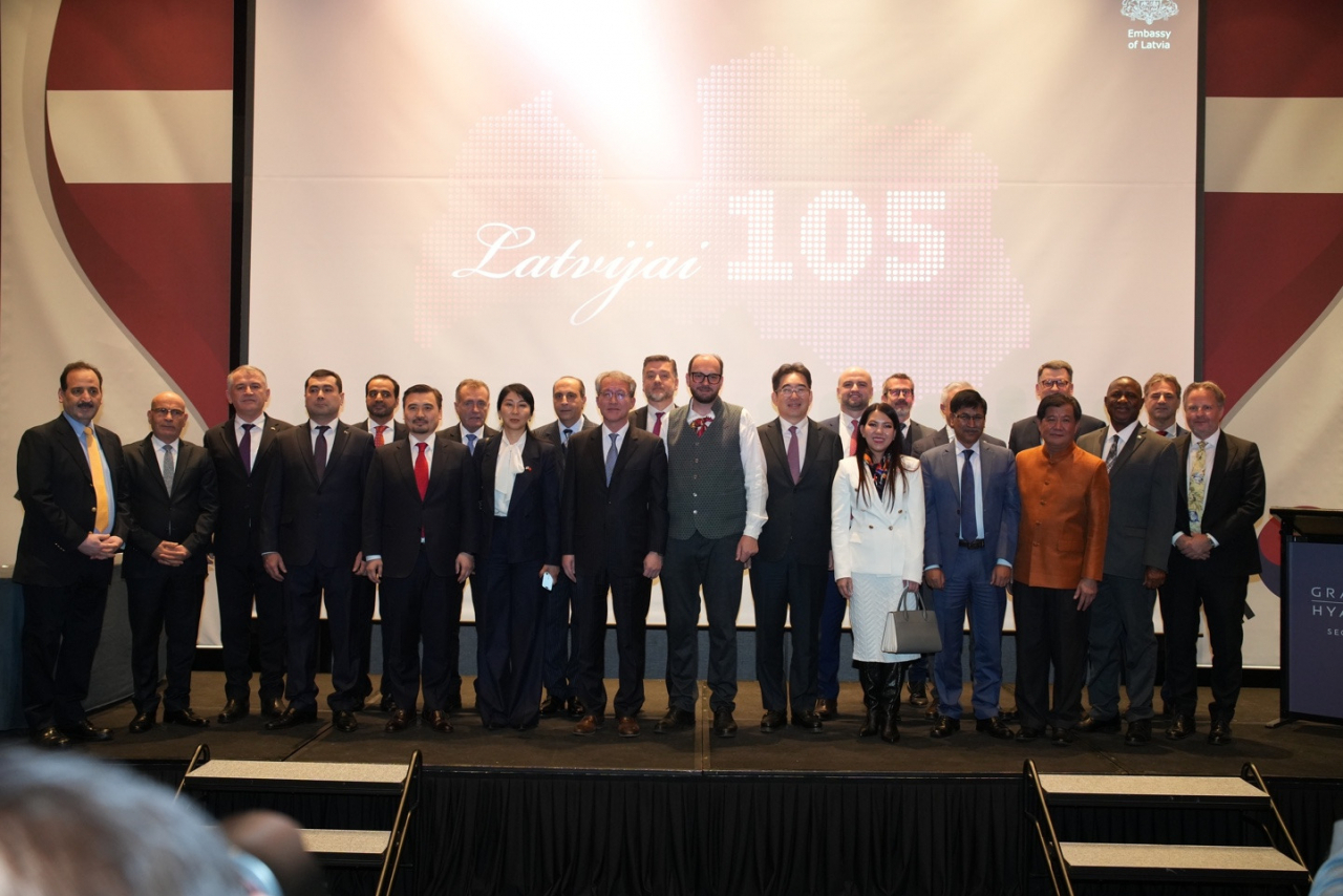 Members of the Diplomatic Corps pose for a group photo during the celebration of Latvia's 105th anniversary of Independence Day at Grand Hyatt Seoul in Yongsan-gu, Seoul on Friday. (Latvian Embassy in Seoul)