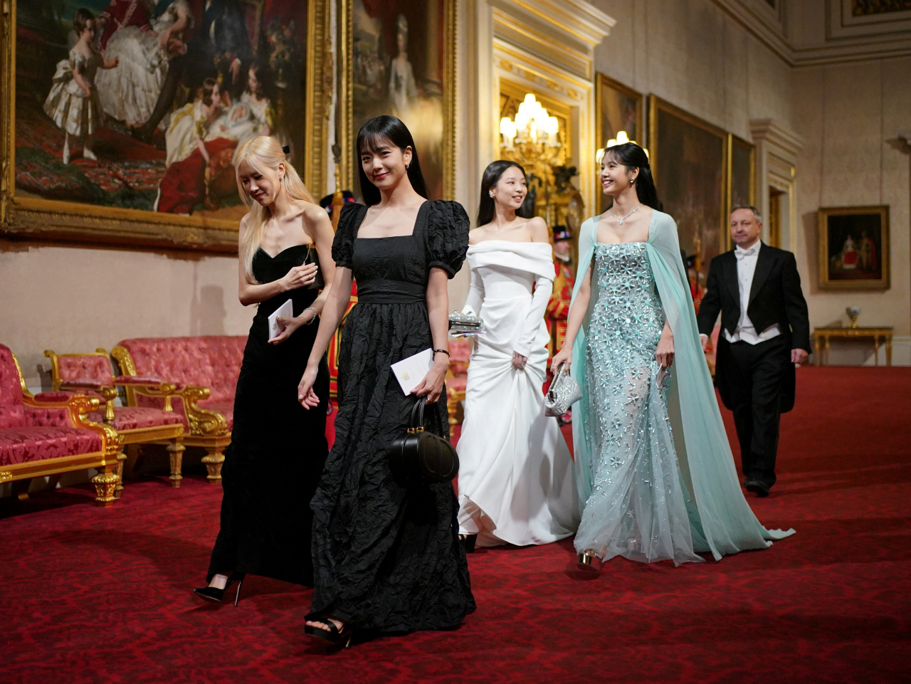 Members of the South Korean girl band Blackpink attend the State Banquet during the South Korean President's state visit at Buckingham Palace in London, Britain, on Tuesday. (Reuters-Yonhap)