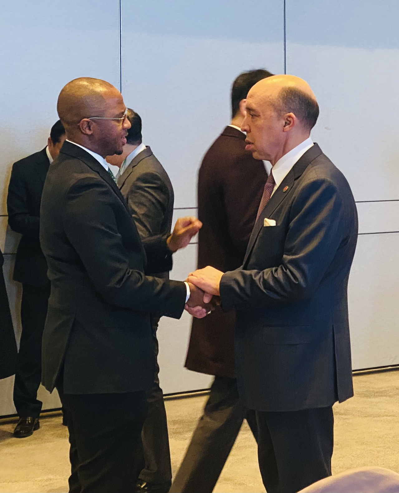 Moroccan Ambassador to Korea Chafik Rachadi(right) exchanges greetings with Tanzanian Ambassador to Korea Togolani Edriss Mavura ahead of the symposium on the theme, 