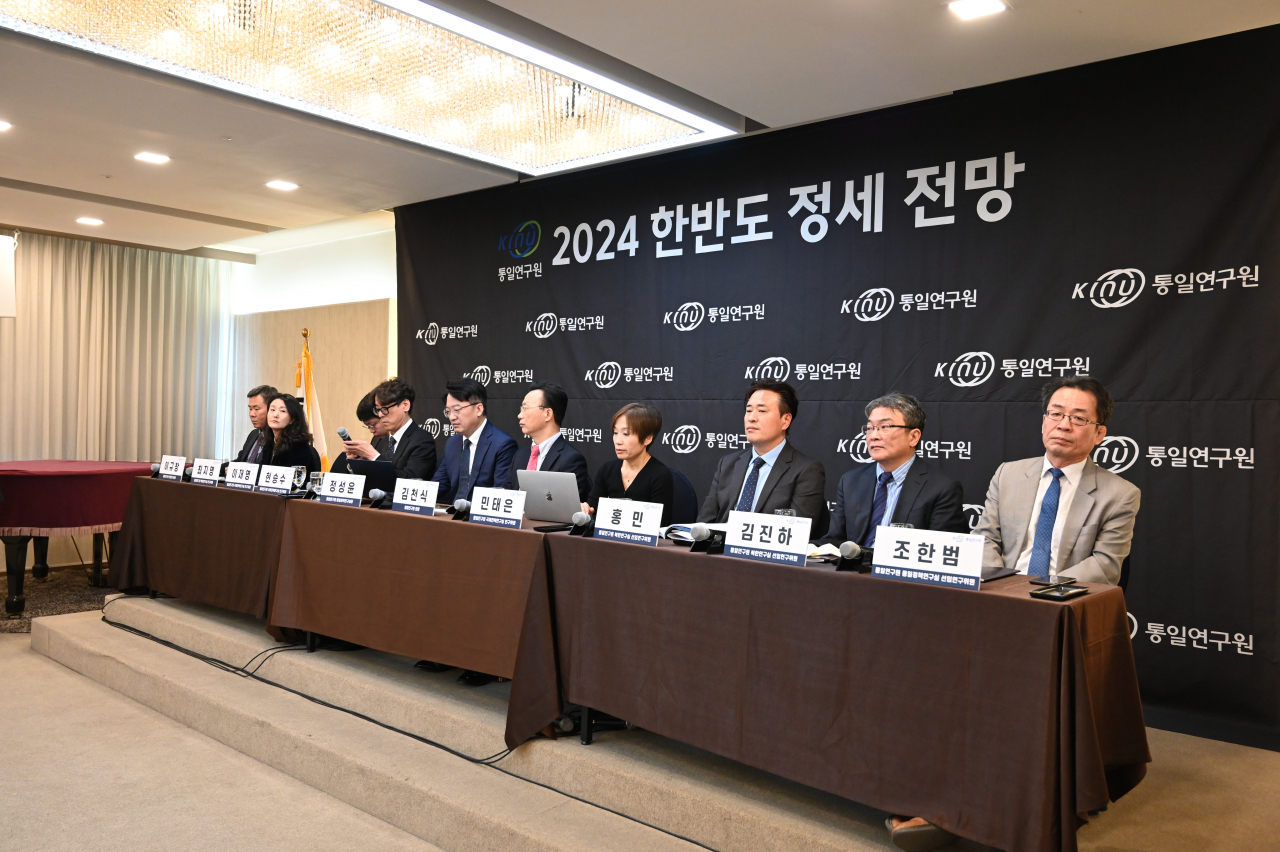 Researchers from the government-funded Korea Institute for National Unification speak during a briefing on the forecast of the security landscape on the Korean Peninsula for 2024 on Wednesday in Seoul. (KINU)