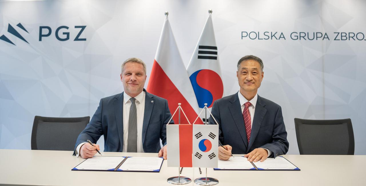This photo provided by Korea Aerospace Industries Co. shows the company's memorandum of understanding signing ceremony held with Polish defense firm WZL-2 in Warsaw on Monday. (Yonhap)