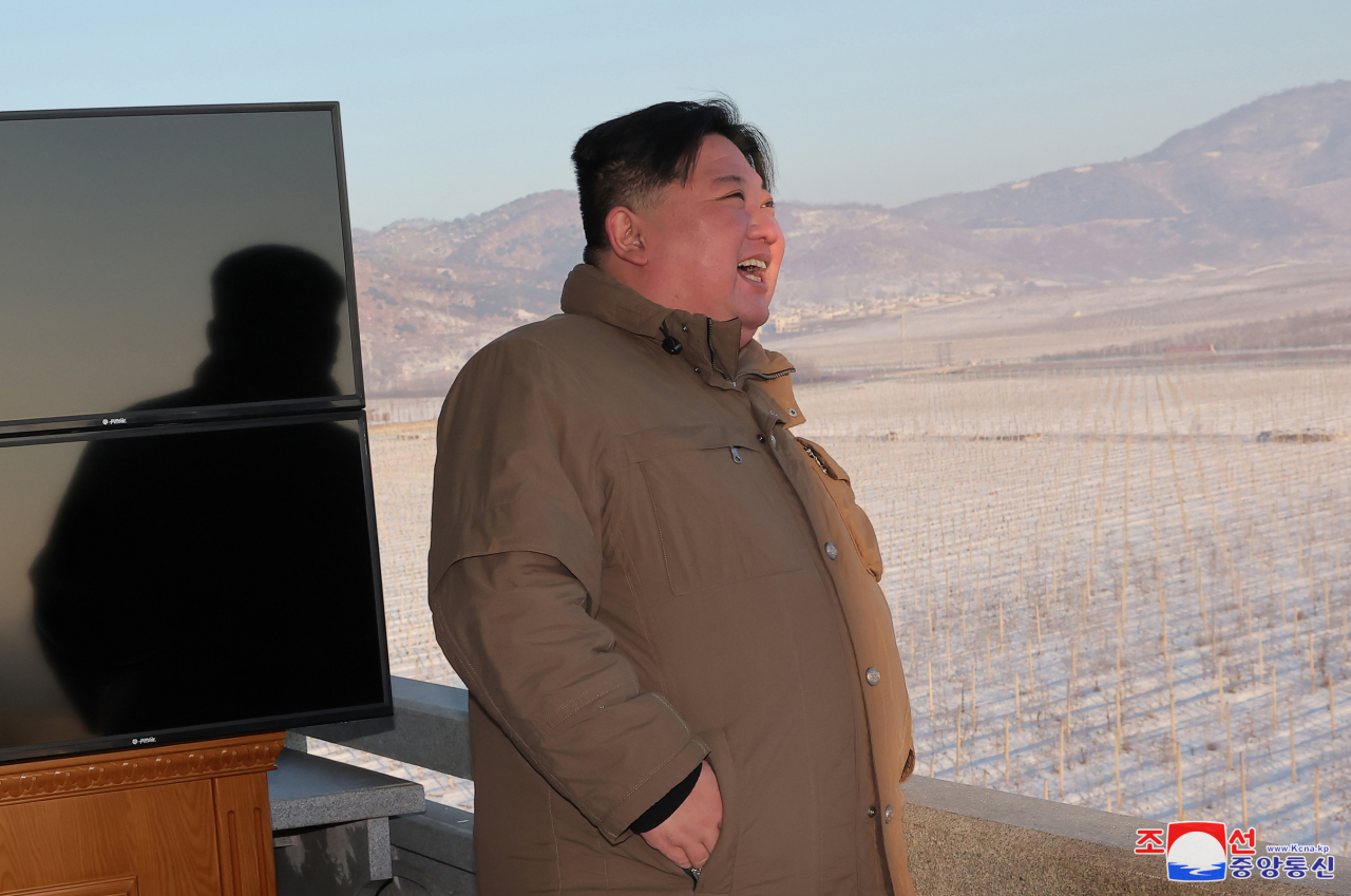 North Korean leader Kim Jong-un inspects the launch of a Hwasong-18 solid-fuel intercontinental ballistic missile on Dec. 18. (KCNA)