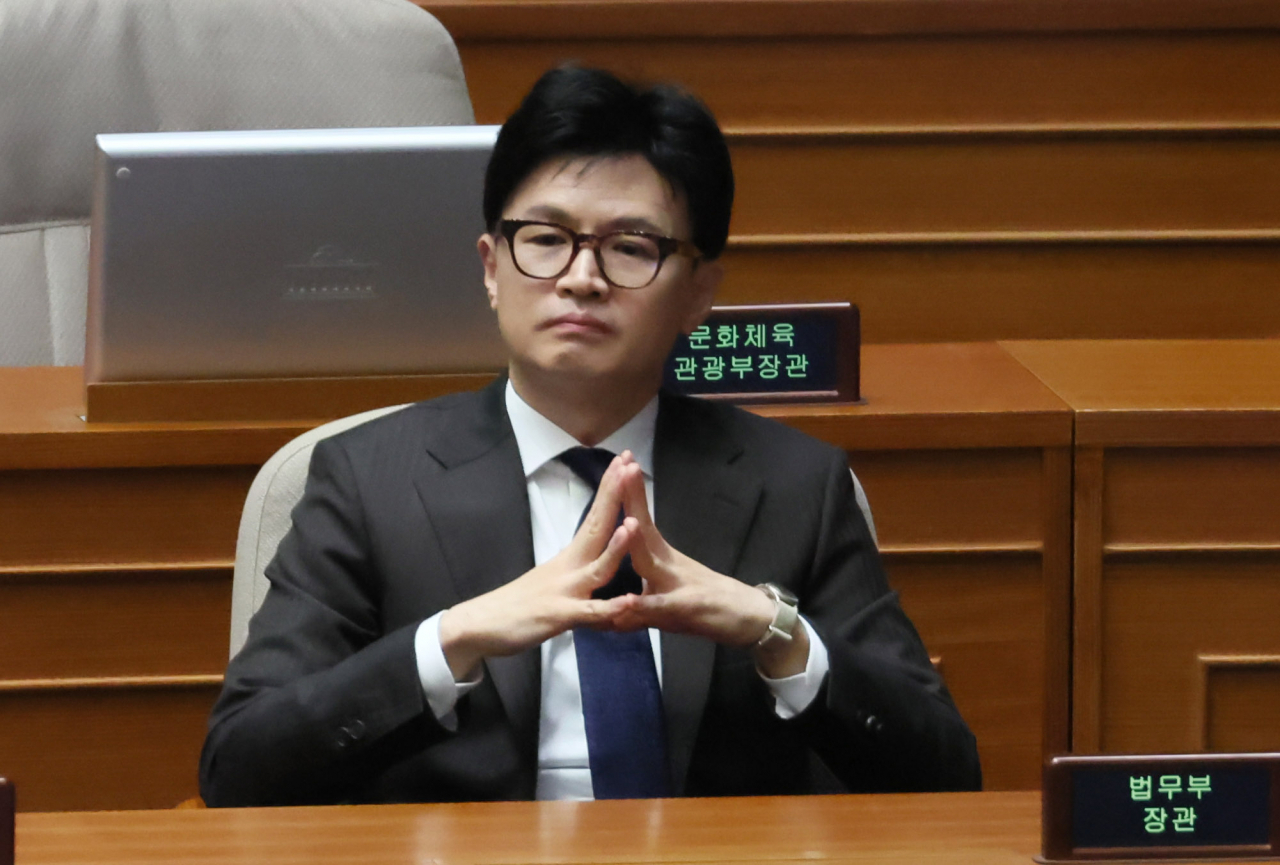 Justice Minister Han Dong-hoon attends a meeting at the National Assembly on Wednesday. (Yonhap)