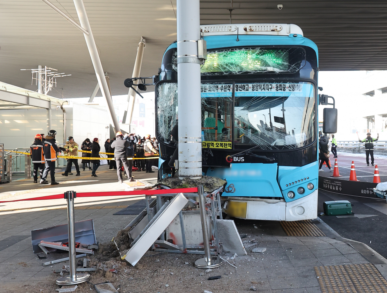 A bus is seen after it rammed into pedestrians on a crosswalk at Suwon Station Transfer Center in Suwon, Gyeonggi Province, on Friday. (Yonhap)