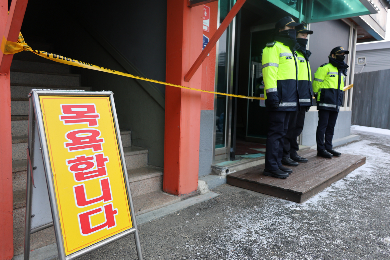 A police line is set up in front of the public bathhouse in Sejong where three elderly women fell into cardiac arrest and died from electrocution on Sunday. (Yonhap)