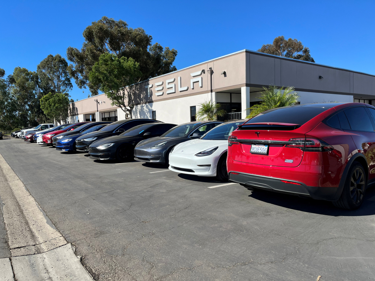 Tesla electric vehicles are parked in front of a Tesla service center in the Kearny Mesa region of San Diego in this undated photo. (Reuters)