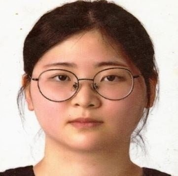 The photo of Jung Yoo-jung, a 24-year-old who was sentenced to life in prison for murder, that was revealed by Busan Metropolitan Police Agency. (Busan Metropolitan Police Agency)