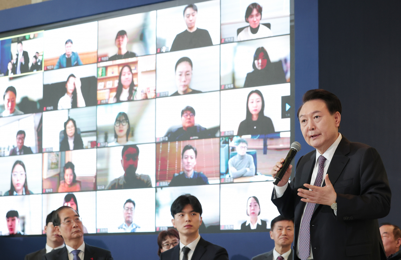 President Yoon Suk Yeol speaks during an event to discuss 2024 government policies aimed at reviving the economic livelihood of the people at a human resource development center of the Korea Federation of Small and Medium Business in Yongin, Gyeonggi Province, Thursday. (Yonhap)