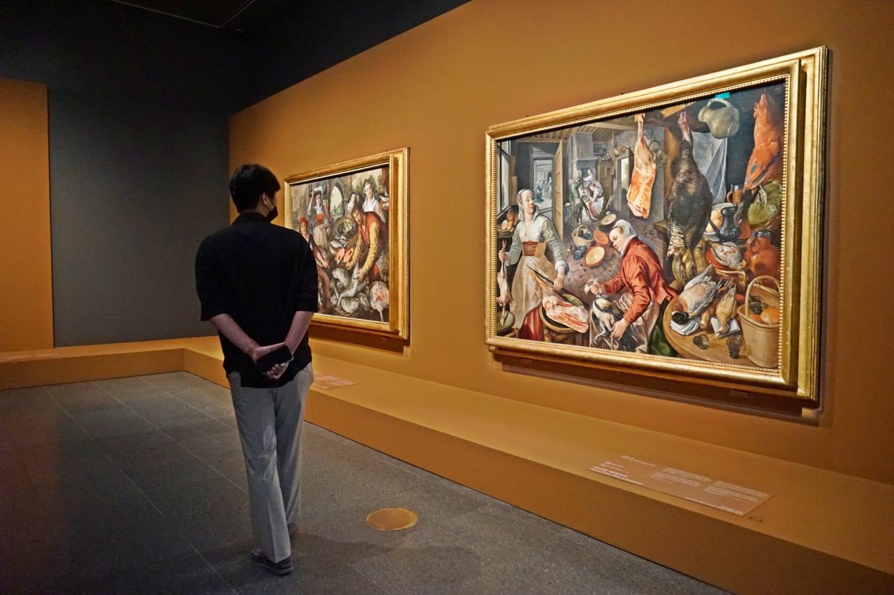 A gallerygoer views works on display in a special exhibition at the National Museum of Korea showcasing 52 paintings from the National Gallery in London. (National Museum of Korea)