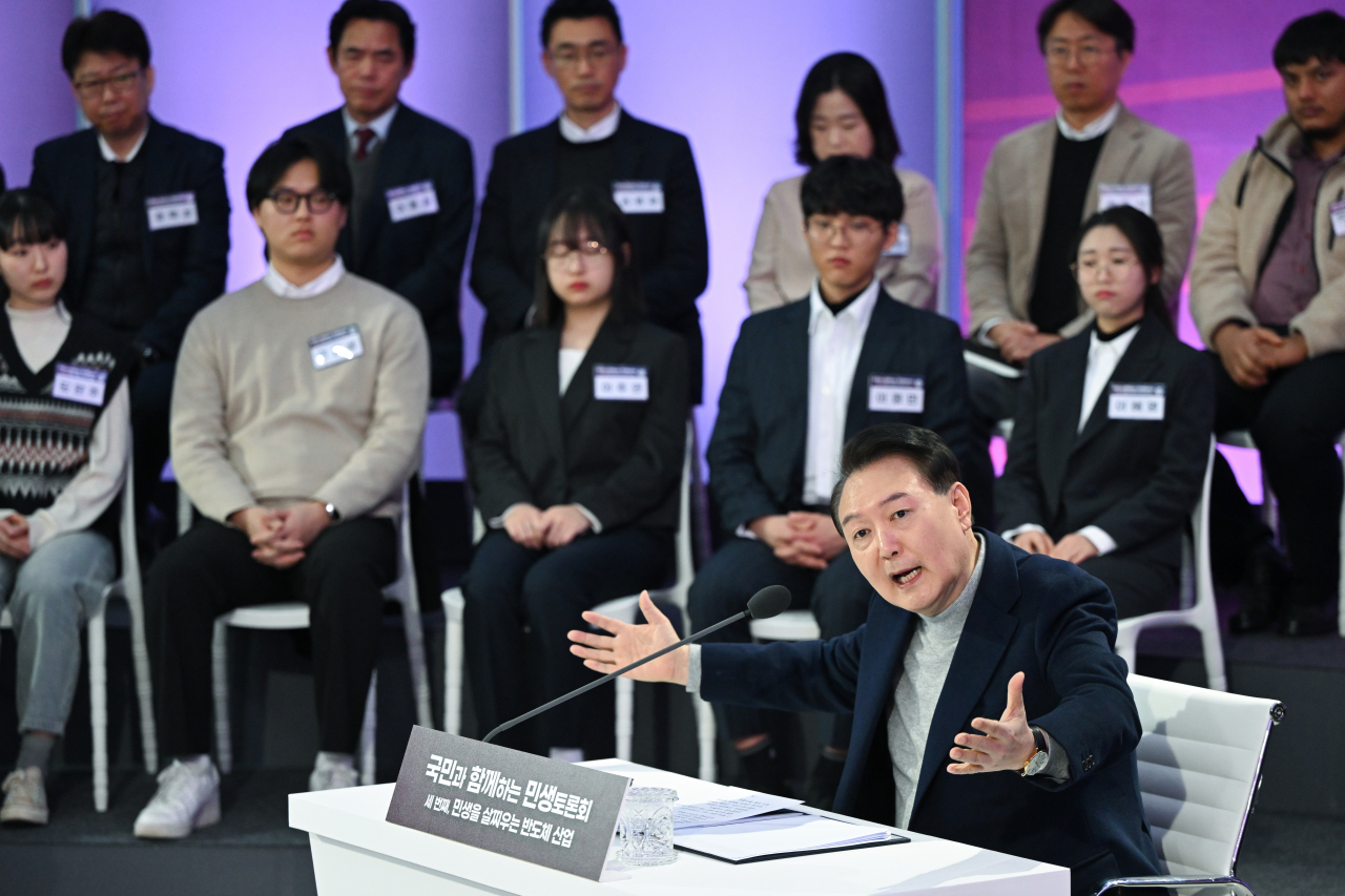 President Yoon Suk Yeol speaks during the public debate over the policy framework with regards to the domestic semiconductor chip industry in Suwon, Gyeonggi Province on Monday. (Yonhap)