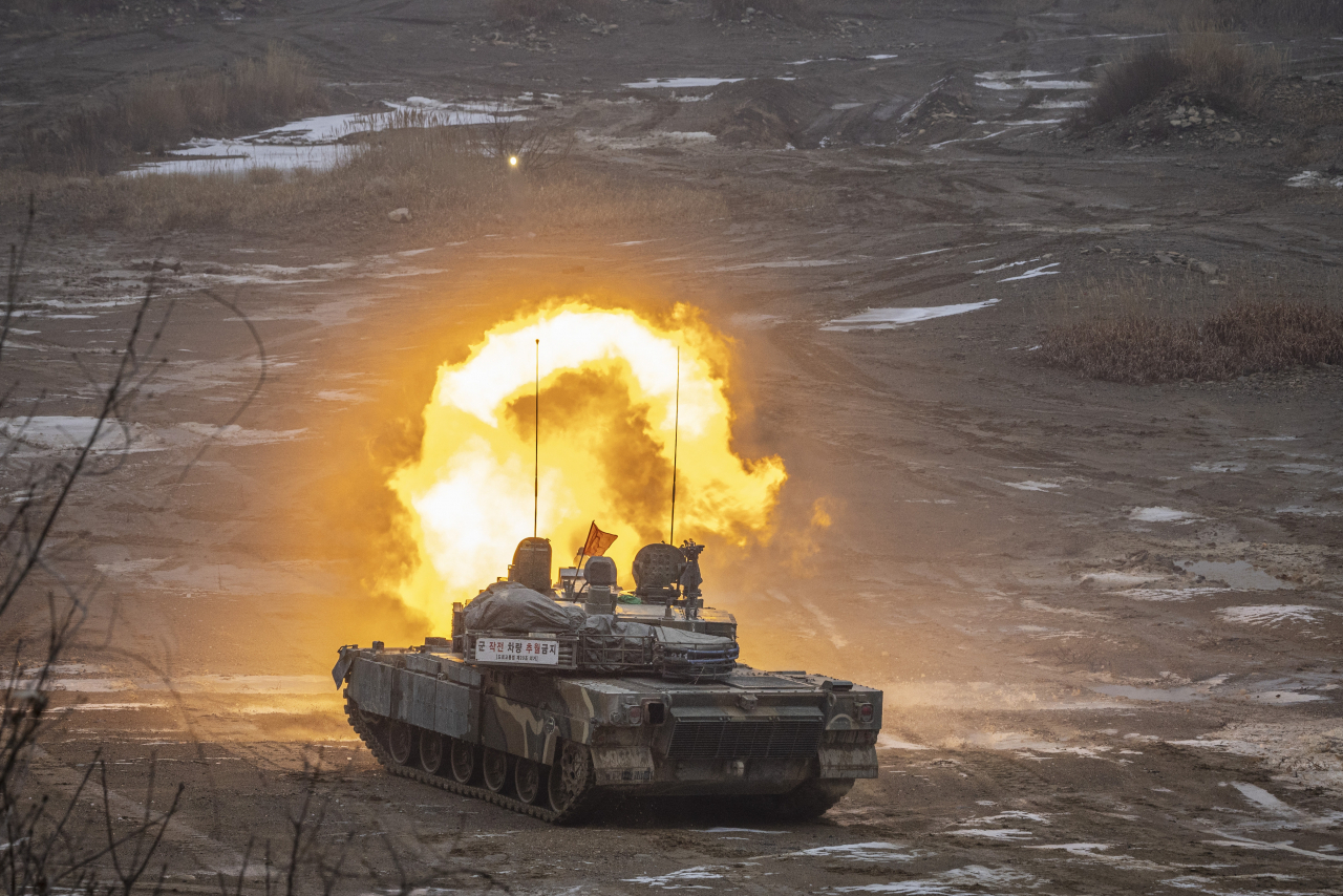 A South Korean Army K2 tank fires during a live fire and maneuver demonstration. (Yonhap)