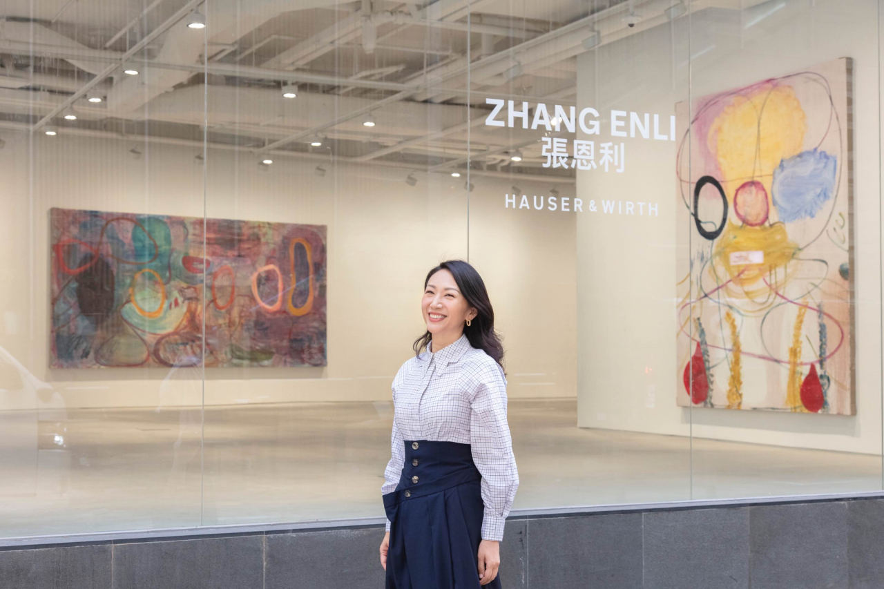 Hauser & Wirth Managing Partner Asia Elaine Kwok poses at the gallery’s opening with the inaugural exhibition by Chinese artist Zhang Enli entitled 