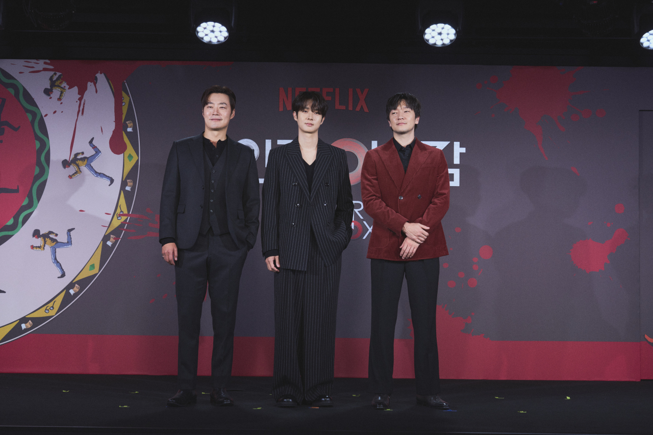 From left: Lee Hee-joon, Choi Woo-shik and Son Suk-ku pose for a photo during a press conference held in Yongsan-gu, Seoul, Thursday. (Netflix)