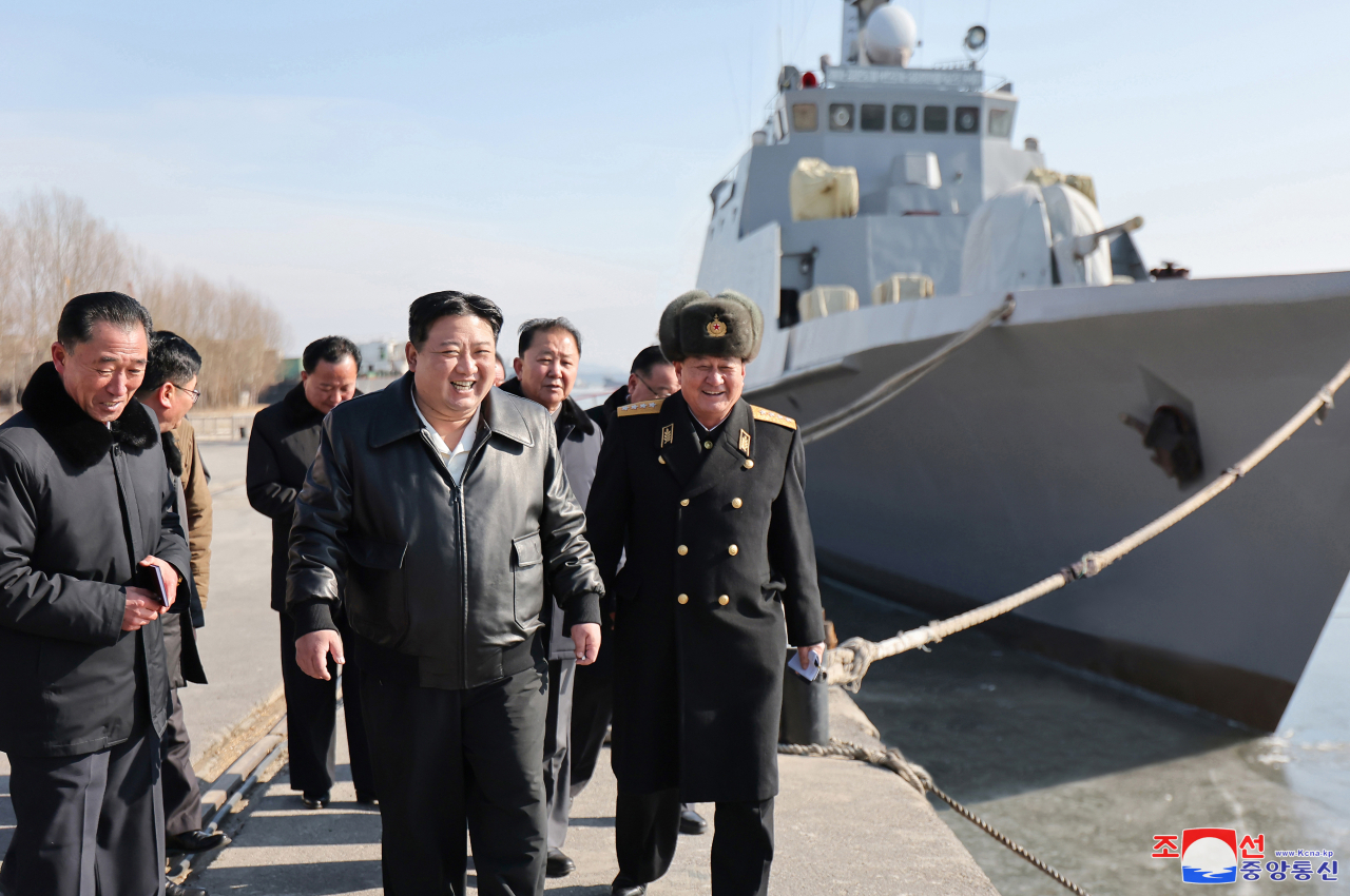 North Korean leader Kim Jong-un (center) visits the Nampho Dockyard on Friday. (KCNA)