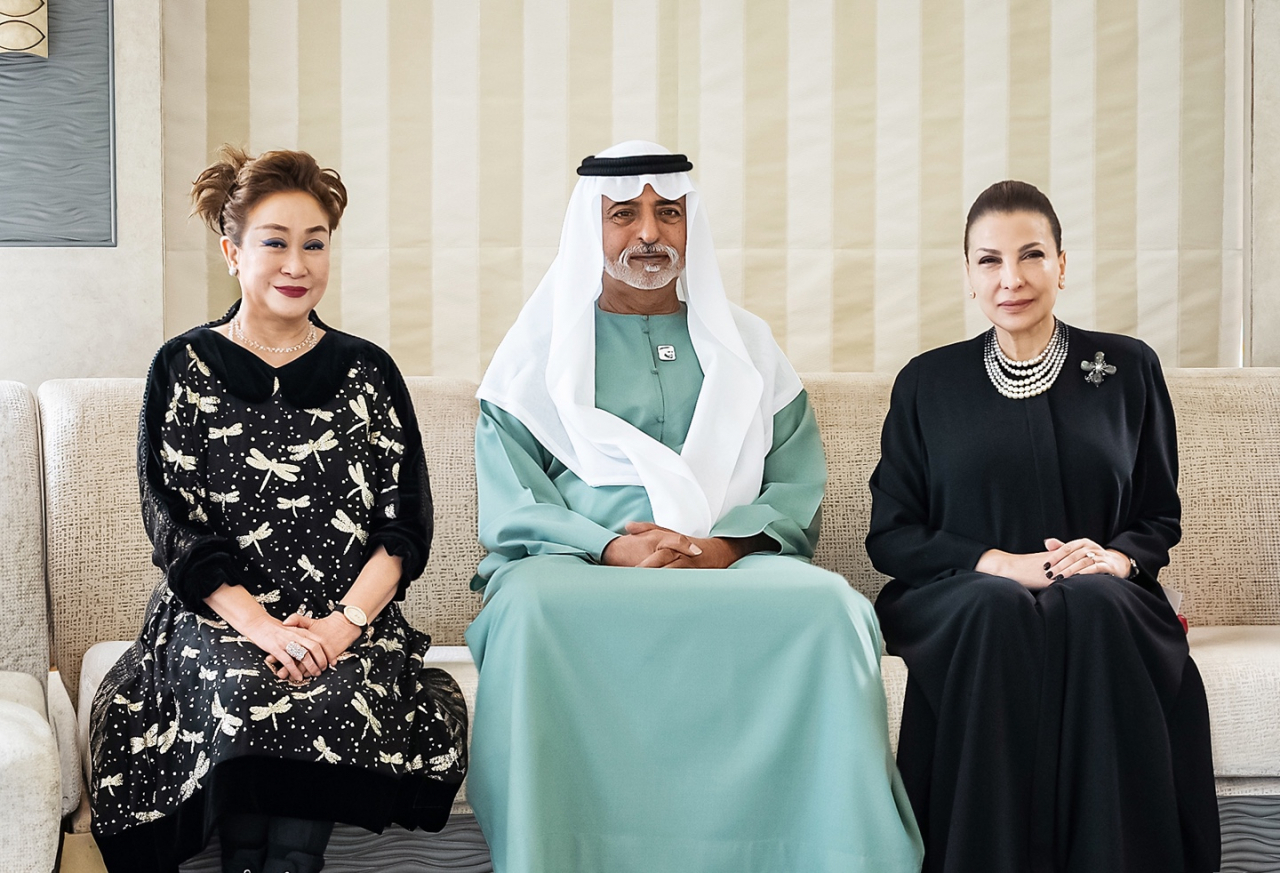 (From left) Miky Lee, vice chair of CJ Group and CJ ENM, UAE’s Minister of Tolerance Sheikh Nahyan bin Mubarak Al Nahyan, and Huda Alkhamis-Kanoo, founder of the Abu Dhabi Music & Arts Foundation, pose for a photo during the Abu Dhabi Festival Award ceremony held in Abu Dhabi on Saturday. (CJ ENM)