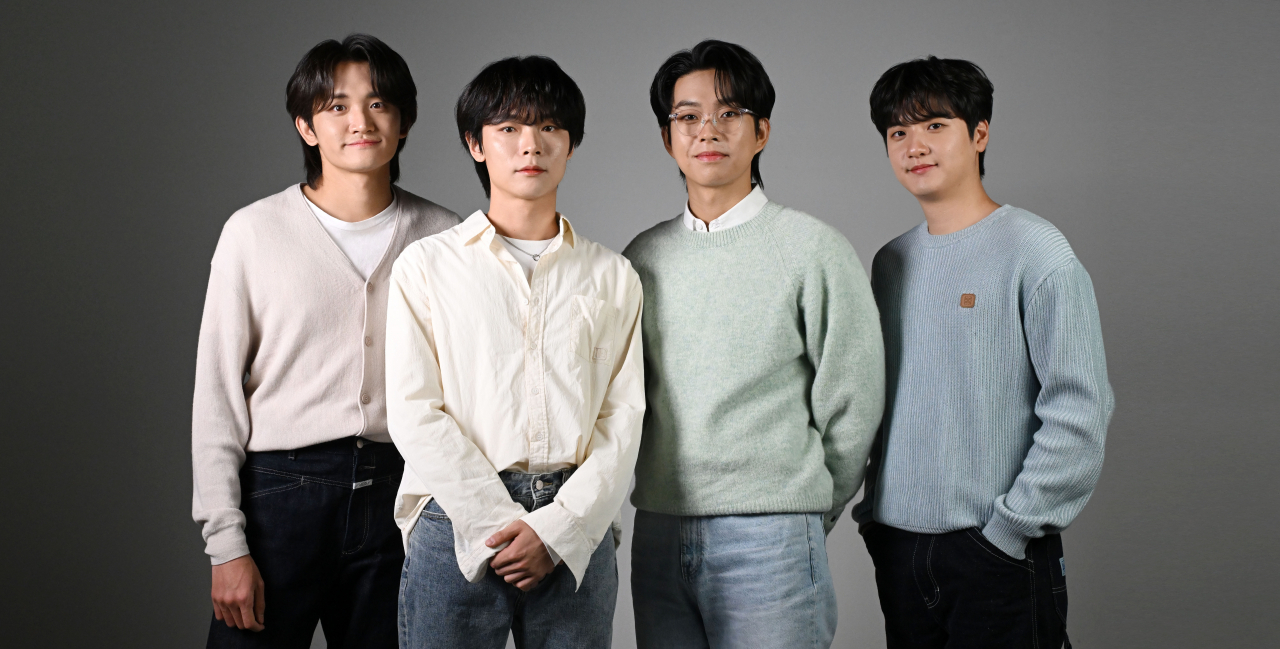 From left: Members of band Lucy, Cho Won-sang, Shin Ye-chan, Choi Sang-yeop and Shin Gwang-il pose for a photo during an interview with The Korea Herald, Jan. 15. (Lee Sang-sub/The Korea Herald)