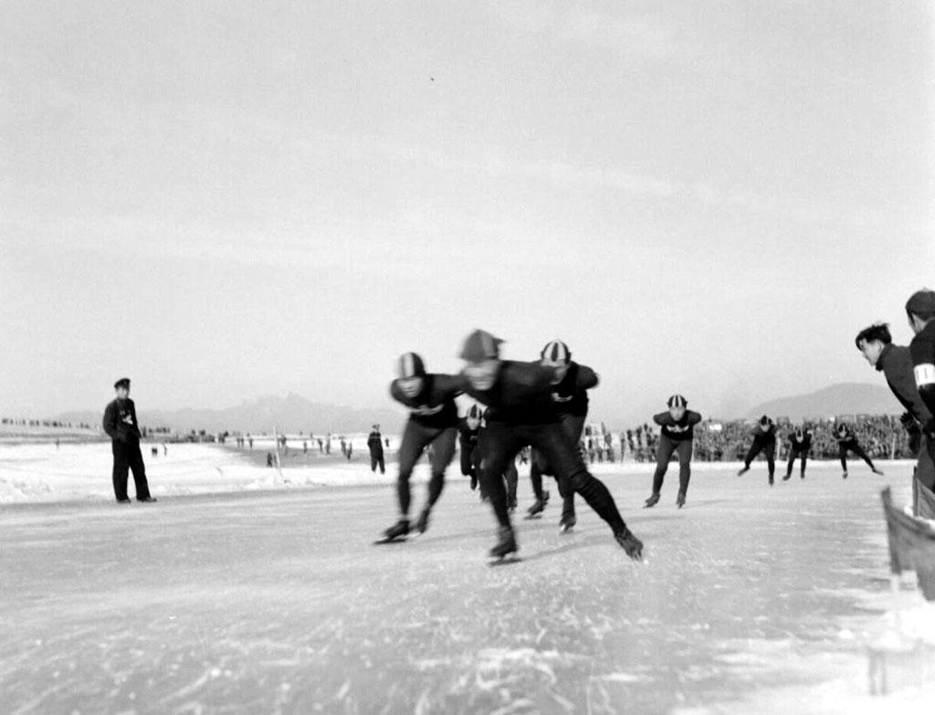Speedskaters race on a frozen Han River during a 1956 winter sports competition held in the middle of the river that cuts through Seoul. (National Archives of Korea)