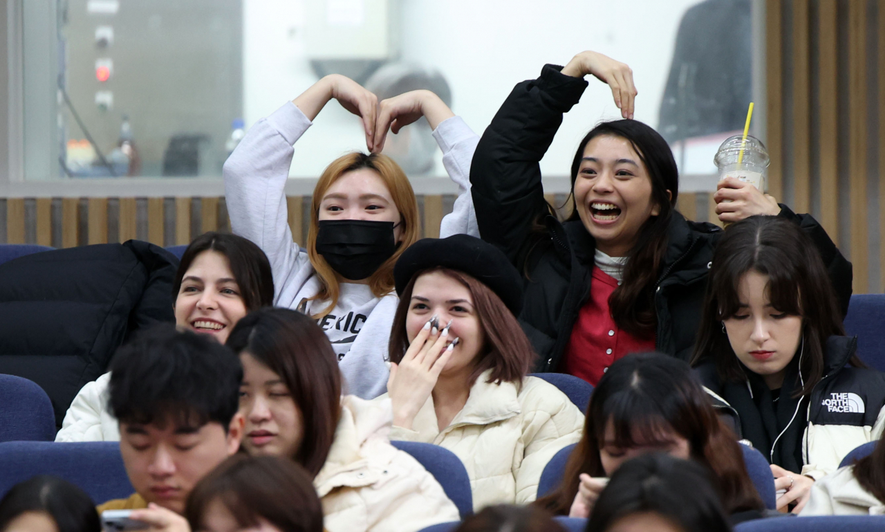 International students cheer for the participants of Ewha Womans University's 