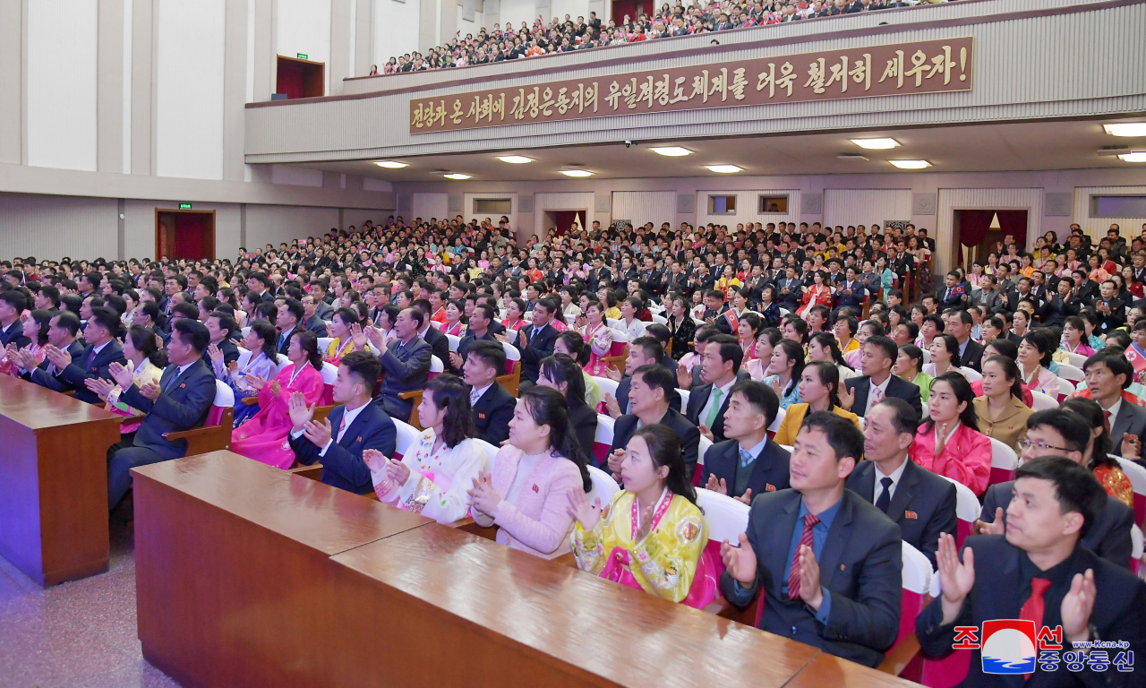 North Korean workers attend an event in Pyongyang on Tuesday, carried the next day. The event was held to mark the 76th founding anniversary of the North's Korean People's Army on Thursday. (KCNA)