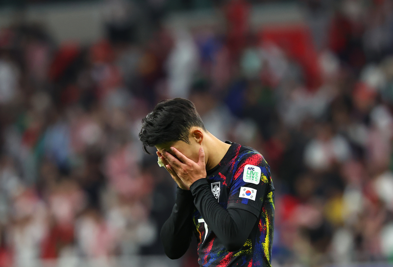 Son Heung-min of South Korea reacts to his team's 2-0 loss to Jordan in the semifinals of the Asian Football Confederation Asian Cup at Ahmad bin Ali Stadium in Al Rayyan, Qatar on Feb. 6, 2024. (Yonhap)