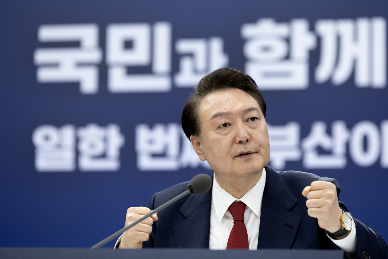 President Yoon Suk Yeol speaks during a government-public debate to discuss ways to improve people's livelihoods through balanced regional development at City Hall in the southeastern port city of Busan on Tuesday. (Yonhap)