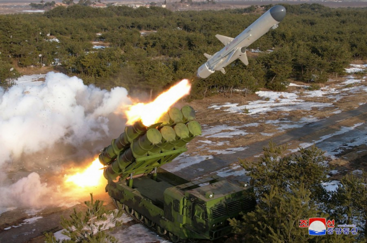 This photo on Thursday, shows the North's test-firing of a new surface-to-sea missile the previous day, supervised by its leader Kim Jong-un. (KCNA)