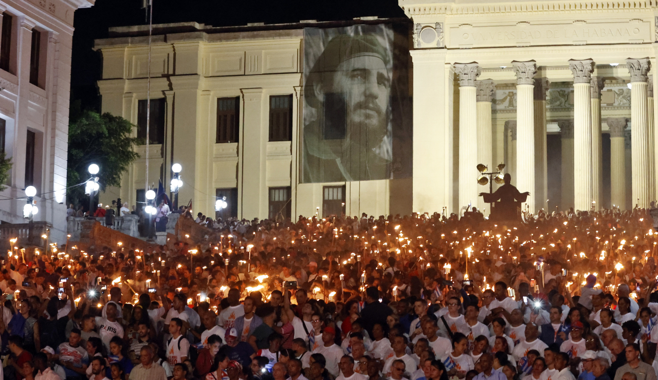 Young Cubans participate in the traditional torch march to commemorate the 171st anniversary of the birth of the country's hero Jose Marti (1853-1895), in Havana, Cuba, 27 January 2024. (EPA)