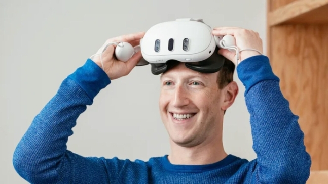 Meta CEO Mark Zuckerberg tries on the Meta Quest 3 mixed reality headset. (Meta)