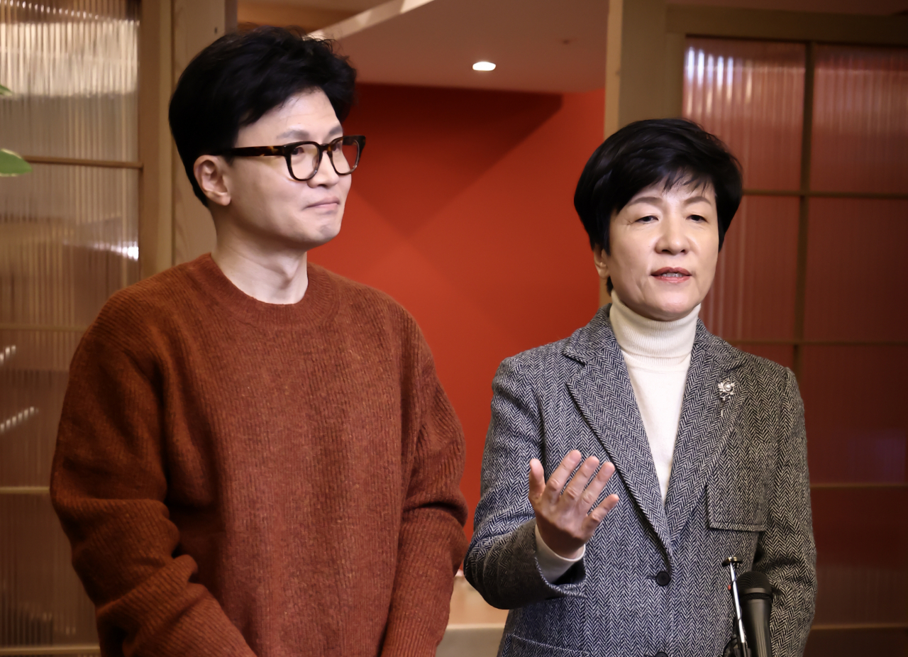 Deputy National Assembly Speaker Kim Young-joo (right) speaks after holding a meeting with Han Dong-hoon, the leader of the ruling People Power Party, in Seoul on Friday. (Yonhap)