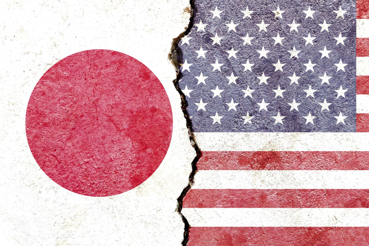 The Japanese (left) and US flags (123rf)