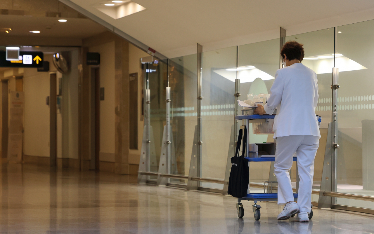 This photo taken Friday shows a nurse at a university hospital in Seoul. (Yonhap)
