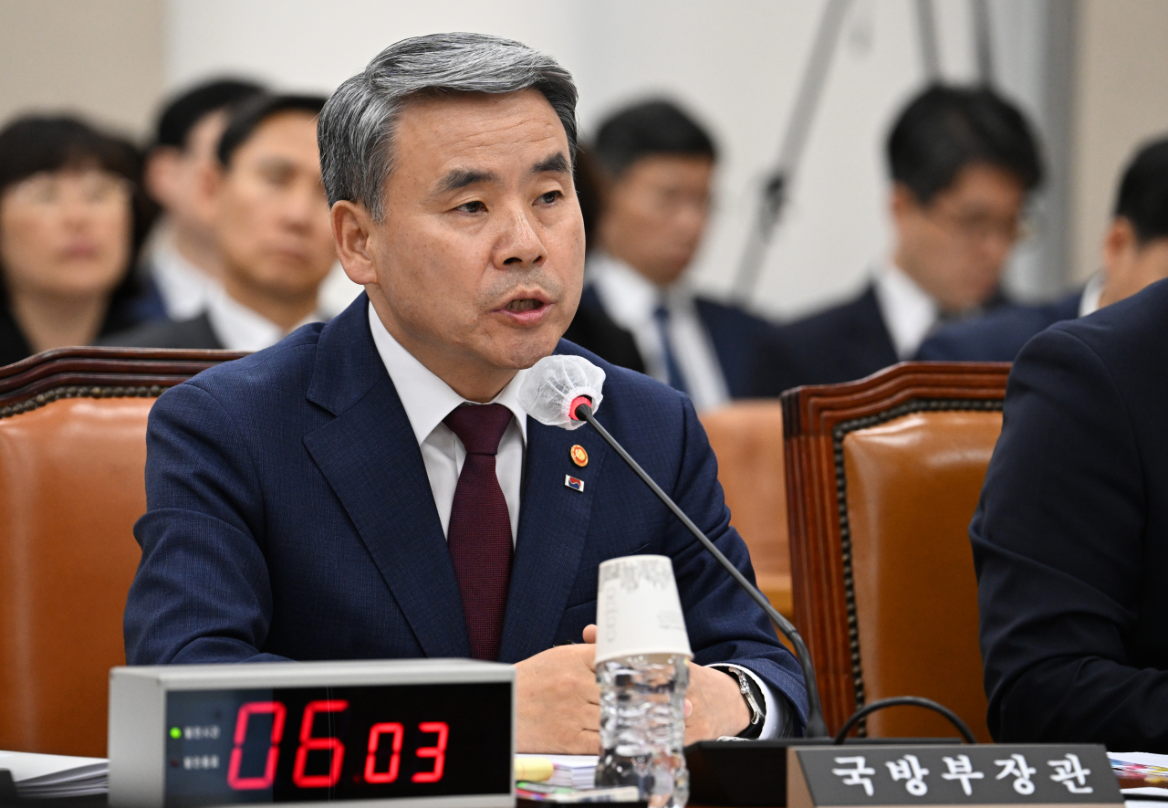 Lee Jong-sup, attending a National Assembly session as then-minister of national defense, responds to questions from lawmakers on June 1, 2023. (The Korea Herald)