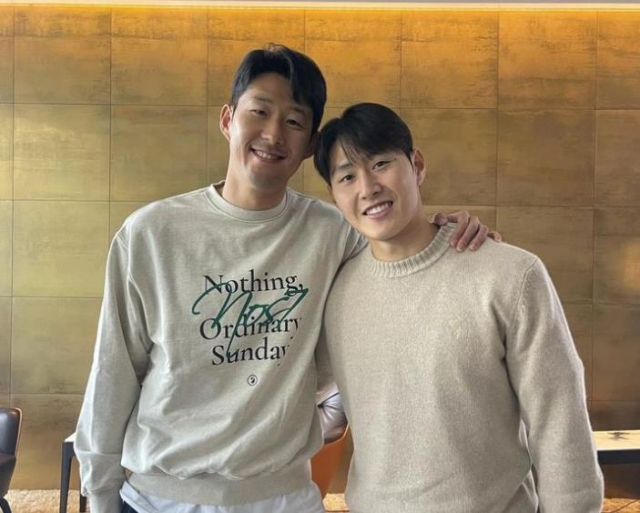 This photo posted on official Instagram page of Son Heung-min shows Son (left) and Lee Kang-in posing for a photo. (Son Heung-min's Instagram page)