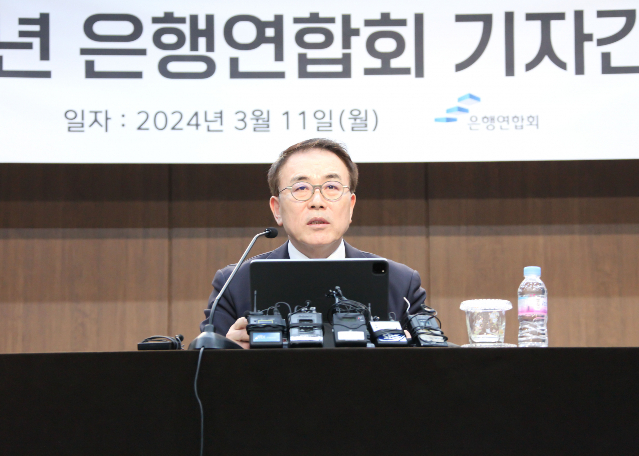Korea Federation of Banks Chair Cho Yong-byoung speaks during a press conference marking his 100th day in office at the association's headquarters in Seoul, Monday. (Korea Federation of Banks)