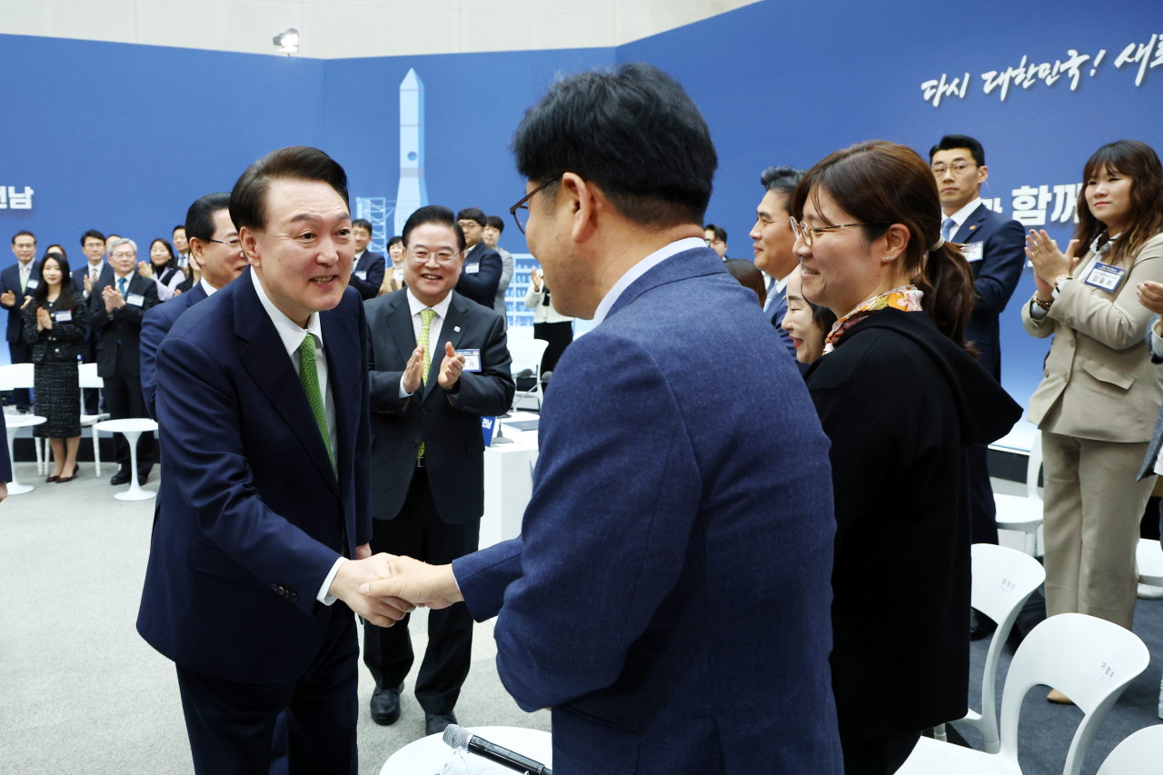 President Yoon Suk Yeol (left, front) attends the 20th policy debate held in Muan-gun, South Jeolla Province, on Thursday,. (Pool photo via Yonhap)