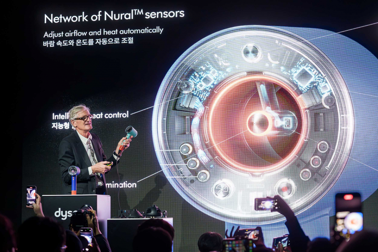 James Dyson, the founder and senior engineer of UK home appliance giant Dyson, introduces the company's new Dyson Supersonic Nural hair dryer at a press conference held in Seoul, Monday. (Dyson)