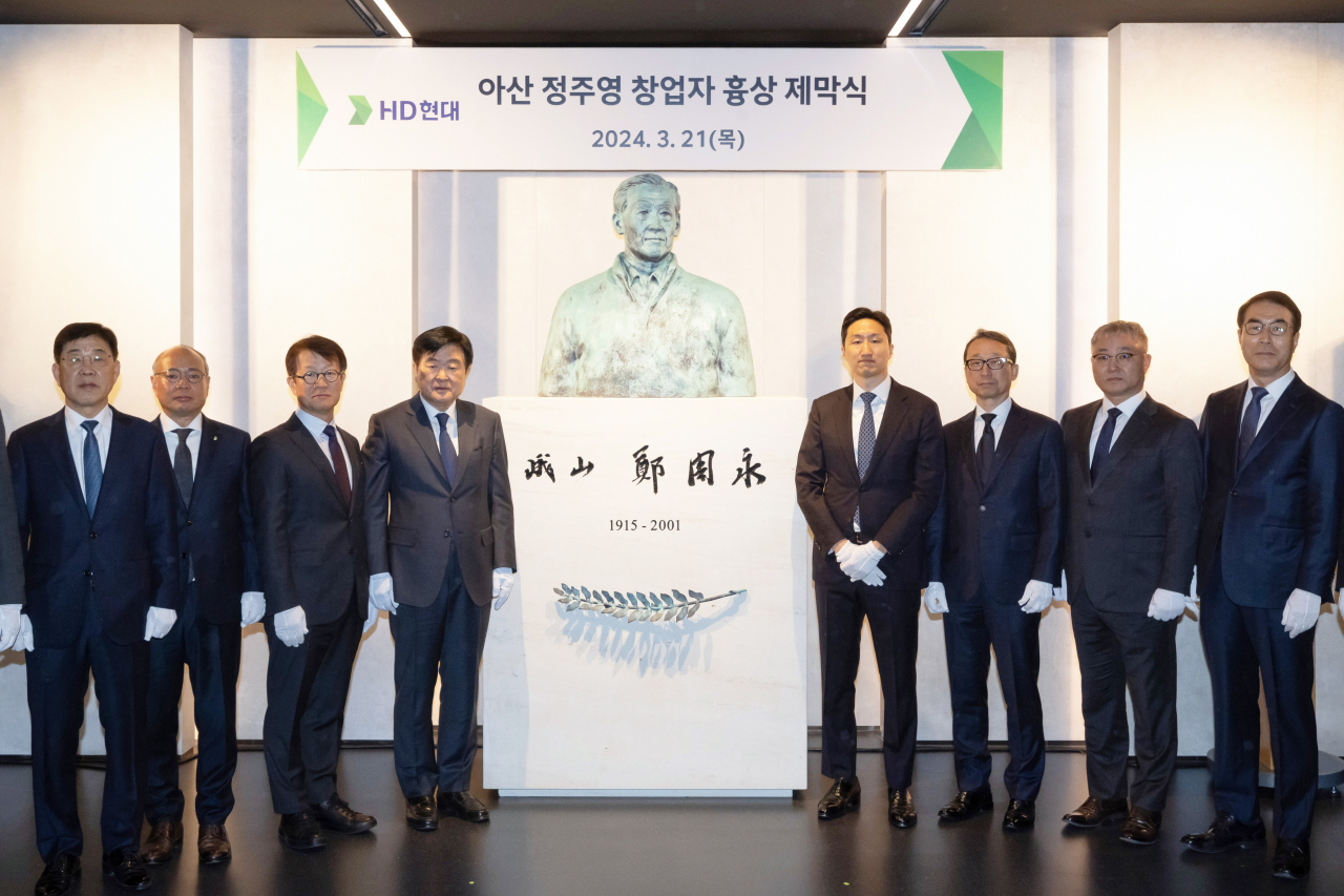 HD Hyundai Chairman Kwon Oh-gap (center left), Vice Chairman Chung Ki-sun (center right) and the group's top executives attend the memorial ceremony for the late Hyundai Group founder Chung Ju-yung held at the Seongnam headquarters in Gyeonggi Province on Thuesday. (HD Hyundai)