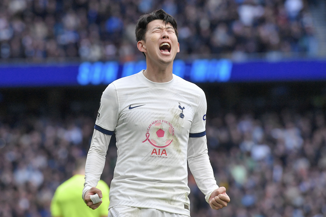 Son Heung-min of Tottenham Hotspur celebrates after scoring against Luton Town during the clubs' Premier League match at Tottenham Hotspur Stadium in London on Saturday. (EPA)