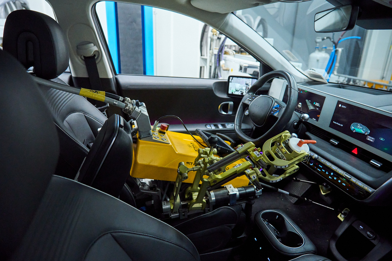 Robots inside testing vehicles execute everything from gear shifting to nuanced braking and acceleration. (Hyundai Motor Group)