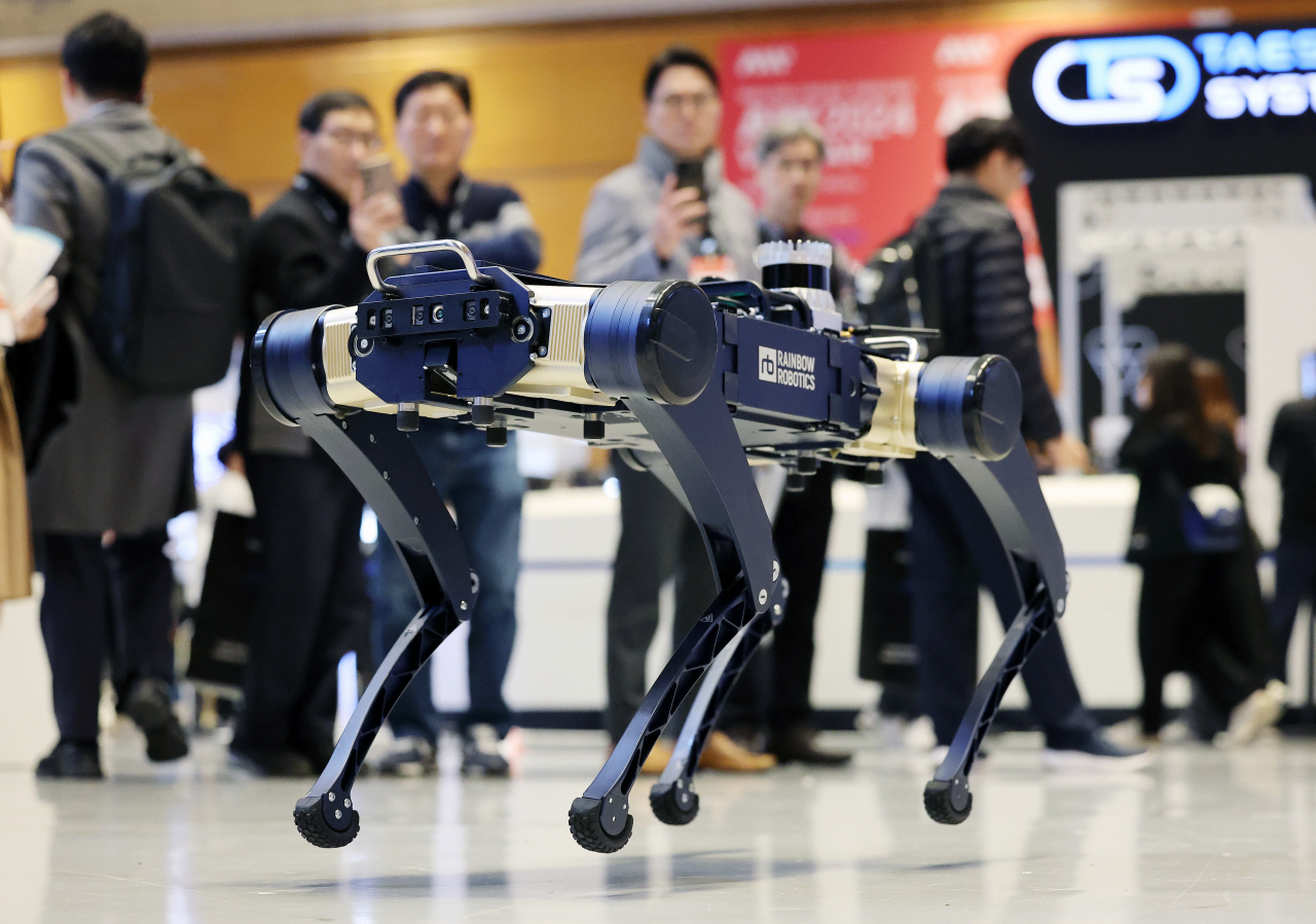 A four-legged robot is demonstrated at the Smart Factory + Automation World exhibition at Coex in southern Seoul on March 27. (Newsis)