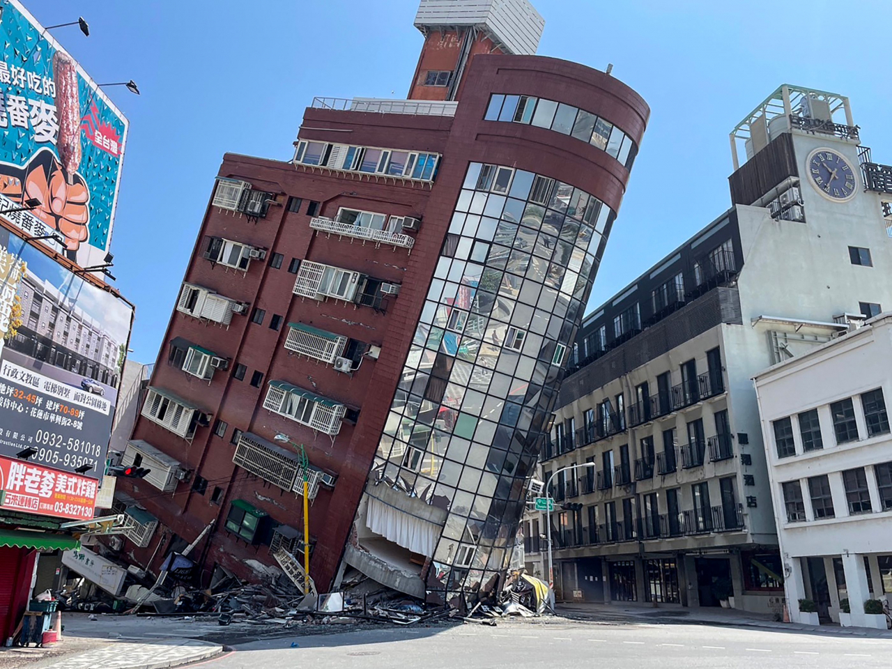 This photo shows a damaged building in Hualien, after a major earthquake hit Taiwan's east on Wednesday. At least one person was feared dead and nearly 60 injured by a powerful earthquake in Taiwan that damaged dozens of buildings and prompted tsunami warnings that extended to Japan and the Philippines before being lifted. (Taiwan's CNA)