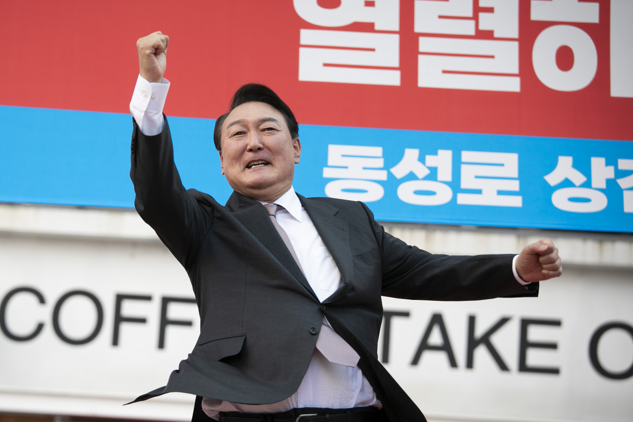 The then President-elect Yoon Suk Yeol celebrates his election victory in Daegu in April 2022. (Pool photo)