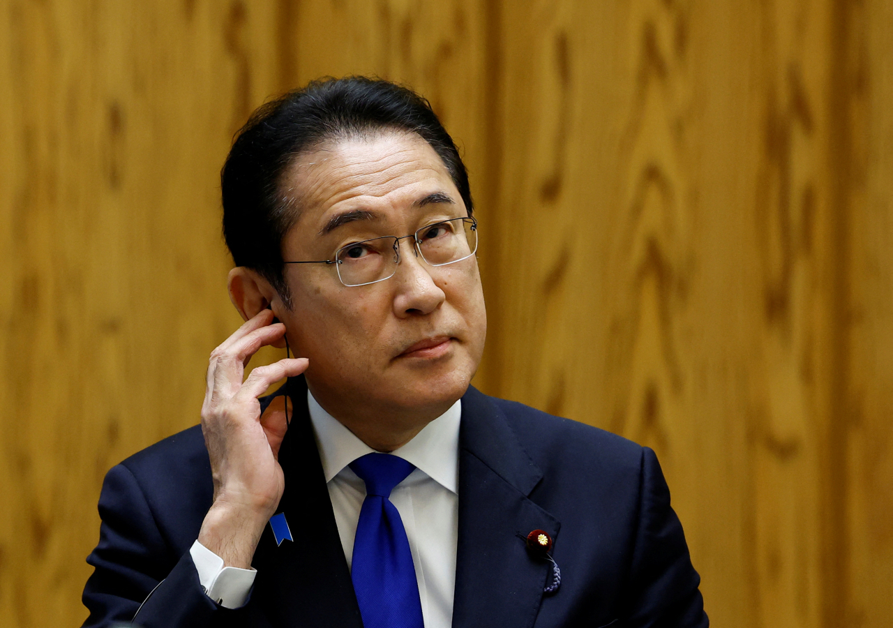 Japan's Prime Minister Fumio Kishida attends a group interview ahead of a planned summit next week with US President Joe Biden, in Tokyo on Friday. (Reuters)