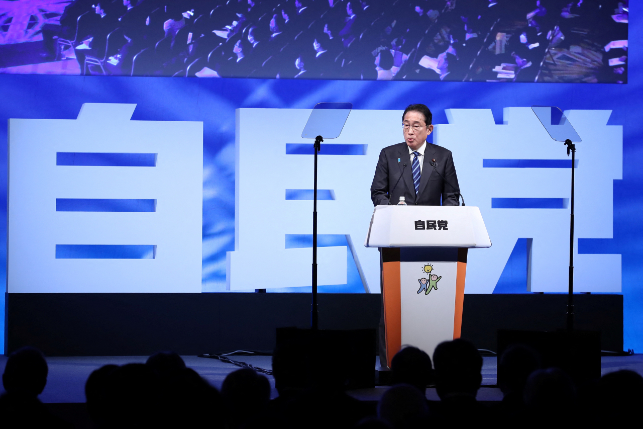 Fumio Kishida Prime Minister of Japan and President of the Liberal Democratic Party (LDP) delivers a speech during the party convention on March 17 in Tokyo, Japan. (Pool via Reuters)