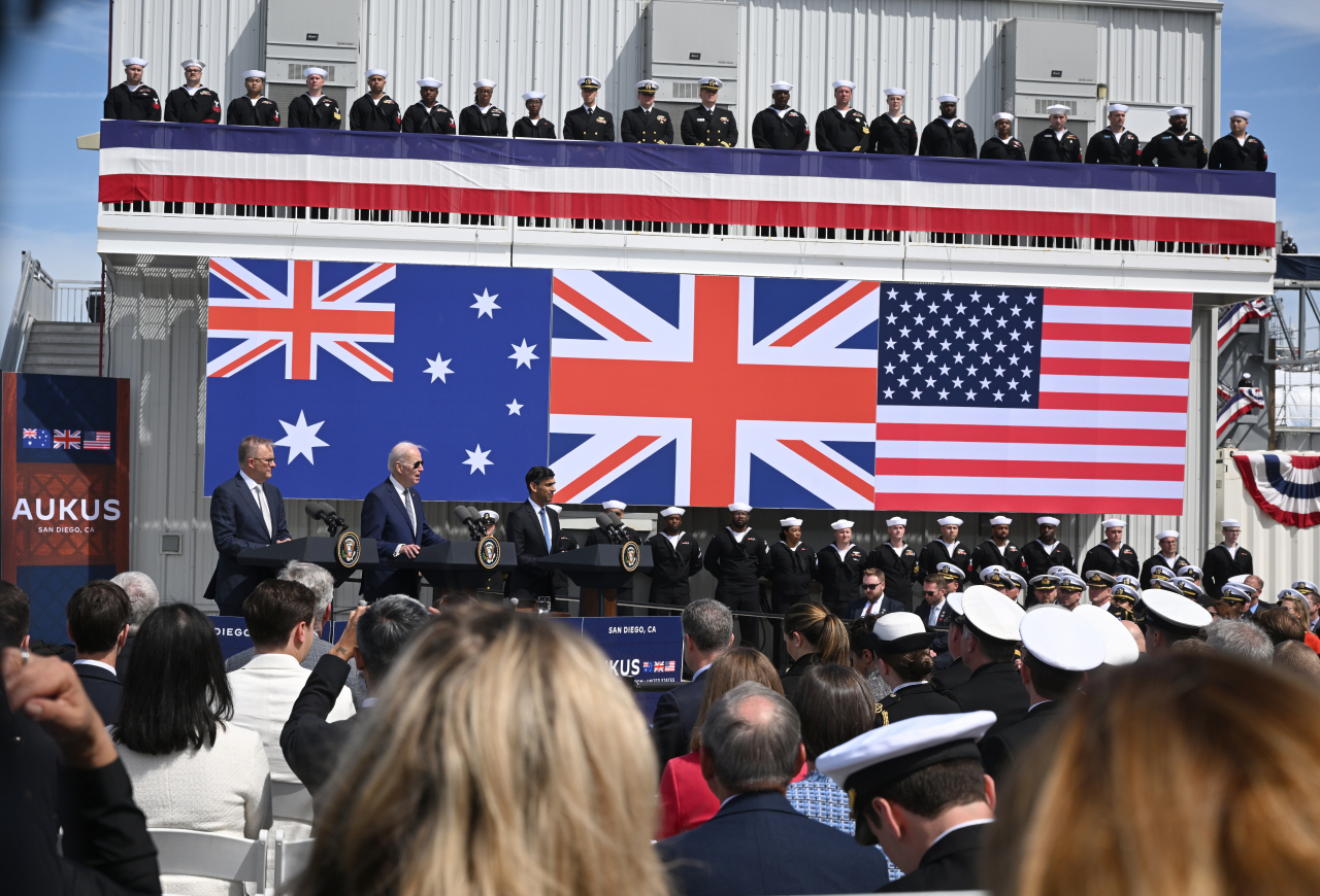 This photo shows US President Joe Biden, Australian Prime Minister Anthony Albanese and British Prime Minister Rishi Sunak delivering remarks on the AUKUS partnership after a trilateral meeting, at Naval Base Point Loma in San Diego, California, on March 13, 2023. (Reuters-Yonhap)